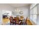 Elegant dining room with hardwood floors and chandelier at 104 Woodvale Cir, Lincolnton, NC 28092