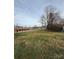 Large backyard with green grass at 129 Mapleleaf Rd, Statesville, NC 28625