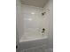 Clean bathroom with a shower/tub combo and updated fixtures at 129 Mapleleaf Rd, Statesville, NC 28625