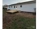 Back of house with deck and patio at 129 Mapleleaf Rd, Statesville, NC 28625