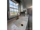 Modern farmhouse sink with gold faucet and quartz countertop at 129 Mapleleaf Rd, Statesville, NC 28625