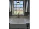 Modern farmhouse sink with gold faucet and quartz countertop at 129 Mapleleaf Rd, Statesville, NC 28625