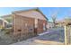 Rear view of brick home with garage and patio at 1308 Princeton Ave, Gastonia, NC 28054