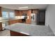 Modern kitchen features granite counters, stainless steel appliances and bright lighting at 1308 Princeton Ave, Gastonia, NC 28054