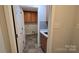 Laundry room with lots of cabinets and tile floors at 1308 Princeton Ave, Gastonia, NC 28054