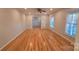 Hardwood floor living room with view into kitchen at 1308 Princeton Ave, Gastonia, NC 28054