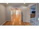 Hardwood floor living room with access to kitchen and other rooms at 1308 Princeton Ave, Gastonia, NC 28054