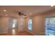 Bright living room with hardwood floors, ceiling fan, and recessed lighting at 1308 Princeton Ave, Gastonia, NC 28054