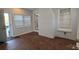 Sunroom features terracotta tile flooring and brick accent wall at 1308 Princeton Ave, Gastonia, NC 28054