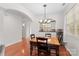 Dining area with hardwood floors and view of kitchen at 19830 Madison Village Dr # 65, Cornelius, NC 28031