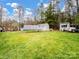 Large backyard with shed and solar panels; plenty of green space at 2430 Lazy Oak Dr, Lancaster, SC 29720