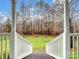 View from porch to backyard with trees and fence at 2430 Lazy Oak Dr, Lancaster, SC 29720