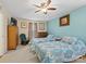 Serene bedroom with twin beds, light blue walls, and ceiling fan at 2430 Lazy Oak Dr, Lancaster, SC 29720