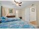 Spacious bedroom with twin beds, ample closet space, and ceiling fan at 2430 Lazy Oak Dr, Lancaster, SC 29720