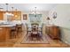 Bright dining area features a charming chandelier and hardwood floors at 2430 Lazy Oak Dr, Lancaster, SC 29720