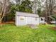 Gray storage shed with ramp access in backyard setting at 2430 Lazy Oak Dr, Lancaster, SC 29720