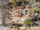 An aerial view shows the layout of the property with a long driveway, surrounded by colorful foliage at 2503 Parnell Dr, Shelby, NC 28150