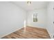 Bedroom with natural light, modern floors, and a fresh, neutral palette at 2503 Parnell Dr, Shelby, NC 28150