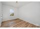 Bright bedroom features new floors and a freshly painted neutral palette at 2503 Parnell Dr, Shelby, NC 28150