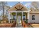 Charming home features a covered front porch with decorative beams and custom railings at 2503 Parnell Dr, Shelby, NC 28150