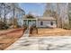 Charming home featuring a well-manicured yard and inviting front porch, accessible by a concrete driveway at 2503 Parnell Dr, Shelby, NC 28150