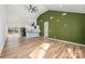 Open-concept living space connected to a modern kitchen and a high ceiling with a fan at 2503 Parnell Dr, Shelby, NC 28150