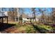 Spacious backyard with mature trees and a wooded area at 2544 Harmony Rd, Rock Hill, SC 29730