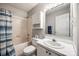 Cozy bathroom featuring a shower-tub combination and single sink vanity with storage at 2544 Harmony Rd, Rock Hill, SC 29730