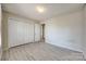 Bedroom featuring a spacious closet and modern wood style floors at 2544 Harmony Rd, Rock Hill, SC 29730