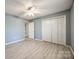 Bedroom featuring light blue walls, light vinyl floors, and a ceiling fan at 2544 Harmony Rd, Rock Hill, SC 29730