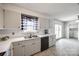 View of the kitchen with black appliances, white countertops, and ample storage space at 2544 Harmony Rd, Rock Hill, SC 29730