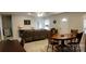 Open living and dining area with L-shaped sofa and wood table at 2544 Harmony Rd, Rock Hill, SC 29730