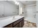 Clean bathroom with a tub and shower combo at 2565 Meadow Crossing Dr, Dallas, NC 28034