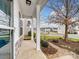 Covered front porch with stone and columns at 2565 Meadow Crossing Dr, Dallas, NC 28034