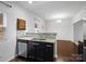 Granite countertop kitchen with sink and dishwasher at 2565 Meadow Crossing Dr, Dallas, NC 28034