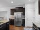 Stainless steel appliances and granite countertops at 2565 Meadow Crossing Dr, Dallas, NC 28034