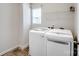 Laundry room with washer, dryer, and shelving at 2565 Meadow Crossing Dr, Dallas, NC 28034