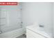 Clean bathroom with a bathtub and vanity at 3721 Cullen Meadows Dr, Davidson, NC 28036