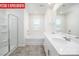 Bathroom boasts double vanity, soaking tub and shower at 3721 Cullen Meadows Dr, Davidson, NC 28036