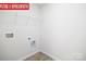 Laundry room with shelving and hookups at 3721 Cullen Meadows Dr, Davidson, NC 28036