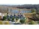 Stunning aerial view of townhomes near pond and lush greenery at 4146 La Crema Dr, Charlotte, NC 28214