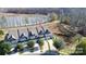 Scenic aerial shot of townhomes with pond and natural surroundings at 4146 La Crema Dr, Charlotte, NC 28214