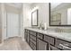 Bathroom featuring granite countertops, dual sinks, and a walk-in shower at 4146 La Crema Dr, Charlotte, NC 28214