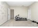 Versatile bonus room features carpet floors, light walls, and exercise equipment at 4146 La Crema Dr, Charlotte, NC 28214