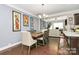 Inviting dining area connects kitchen and living room with stylish decor at 4146 La Crema Dr, Charlotte, NC 28214