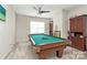 Recreation room featuring a billiard table, ceiling fan, and neutral colored carpet at 4146 La Crema Dr, Charlotte, NC 28214