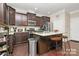 Well-appointed kitchen features stainless steel appliances and granite countertops at 4146 La Crema Dr, Charlotte, NC 28214