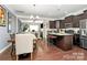A spacious kitchen with modern appliances and a view to the living room at 4146 La Crema Dr, Charlotte, NC 28214