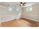 Bright bedroom featuring hardwood floors, recessed lighting and large window views at 549 Spring Sw St, Concord, NC 28025