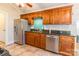 Modern kitchen with stainless steel appliances and wood cabinets at 549 Spring Sw St, Concord, NC 28025